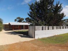  37 Gibson Way Hopetoun WA 6348 $260,000 RENOVATED & READY TO GO! This revamped beauty on Gibson Way deserves your inspection. All the hard work has been done with just a few minor cosmetic finishing touches required to make this the perfect affordable family home. Located on a fully secure and private 809sqm block with a 4 bedroom home plus large shed you can’t go wrong. The home has been re-clad and has a brand new roof and new solar HWS. Inside there’s 4 large bedrooms and a central living space with reverse cycle air con. This leads onto the new modern kitchen/combined dining area. The attractive contemporary kitchen has loads of storage and bench space, and a new electric oven/stove top. The bathroom/combined laundry area has been revamped giving it a fresh and clean feel. Outside there’s a large powered shed (approx 8m x 7m) with good roller door access and PA door. The shed roof provides a large covered alfresco area. There’s two huge rainwater tanks, grassed areas front and back, plus a quaint front veranda to enjoy the morning sunshine. Gardens are easy care and the property is fully fenced ensuring maximum privacy and a safe and secure yard for the kids and pets to run amok. Access is excellent so storing your boat, caravan, truck – whatever it may be – wont be an issue. Call us today to arrange your inspection of this attractive property. 4 bedrooms 1 bathrooms Land Area 809 square metres 