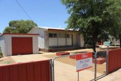  3 Omega St Southern Cross WA 6426 $110,000 NEAT AND TIDY - TWO BEDROOM PLUS This home is very well presented and would ideally suit a first home buyer or retirees looking to down size. Southern Cross is a wonderful country town that benefits from both the Farming and Mining Industries. Home consists of two bedroom, 1 bathroom, formal lounge, eat in kitchen, internal laundry, W/C, rear patio and breezeway to massive 5m x 3.5m games room. Reverse cycle split system A/C units in master bedroom, kitchen and rear games room. Tile fire and c/fan to lounge. Electric 125L HWS. Concrete paths and driveways with single garage and single carport parking. Low maintenance yards, poly 2500L rainwater tank and two small gardens shed. Contact Exclusive Selling Agents Elders Real Estate, phone Will Morris 0448 415 537. Other features: Close to Schools,Close to Shops,Close to Transport,Fireplace(s) Property Details Elders Property ID: 9163545 2 bedrooms 1 bathrooms 2 car parks Land Area 1000 square metres Single garage Single carport Air Conditioning 