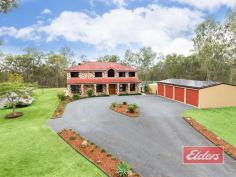  140 Canterbury Dr Mundoolun QLD 4285  $659,000 35 Squares, 5 Acres, 5 Bedrooms … Space and privacy abound here on this elevated 5 acres, with views to Mount Tamborine. The cul de sac position ensures a peaceful and tranquil environment, and you will be pleased to discover a very well specified family home awaits your inspection, with ducted air-con inside and an impressive pool area and plenty of shed space outside. Double door entry leads into the entry hallway, with feature stairway leading to the upper level while the main hallway continues through to the family room, with mountain views beyond.  The living areas are sure to impress, with a very comfortable formal lounge, leading through to a formal dining (currently used as an office). Then there’s the large family room with equally impressive rumpus, both of which enjoy easy access to the outdoor entertainment area. In addition, there is another lounge / or activity area upstairs, and if stairs are a concern, well no need to worry – there’s even a lift!  The hub of the home is undoubtedly the kitchen and this will impress – extensive bench and storage space (plus a walk-in pantry), await your inspection, all of which is complimented by quality appliances while the outlook is simply superb – it’s a kitchen that you will want to be in, rather than having to be in ! Cupboard space too, will impress with a plentiful supply both upstairs and down, while the under stairs cupboard adds even more storage. Bedroom space is excellent, with 4 of them having large built-ins, while the huge master bedroom has a large walk-in robe and suitably impressive en-suite, as you can see in our images. The family bathroom too will not disappoint and being a 2 story home, there is also a downstairs toilet with wash basin for your convenience. Moving outside, you will find a large and comfortable outdoor entertainment area, with servery out from the kitchen, where you will be able to enjoy lovely mountain views, and an equally impressive pool area, with a large in ground salt pool, with in-built spa at one end and a cascade water feature at the other. It’s the perfect focal point for your family, and a great place to relax and call home. The shed space is also impressive, in addition to the 4 bay shed beside the house (which has a 28 panel 5.2 Kw solar power system on one side of the roof), you will also find, on the opposite side of the courtyard, additional shed space and covered vehicle storage - perfect for a horse float, bobcat or more vehicles and equipment.  So if you are struggling to find that elusive large family home, then I’m tempted to say that they don’t come much bigger or better than this - you will enjoy a quiet rural position with stunning views, yet you are perfectly positioned too for easy access to both the Gold Coast and Brisbane CBDs. Property Details Elders Property ID: 9766834 5 bedrooms 2 bathrooms 8 car parks Land Area 4.94 acres 8 car garage 