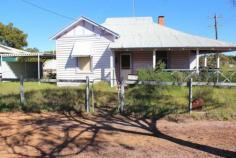  18 Stickland St Wongan Hills WA 6603 $125,000 Handyman's Dream This home is a fantastic fixer and will be a great opportunity for the right people. Bring your tool box, some imagination and go for it. Located in the Wheatbelt town of Wongan Hills this weatherboard and iron home will benefit from a face lift. The home has good bones, you have jarrah floorboards throughout the home, 3 bedrooms, plus a sleep-out, front lounge and large kitchen/dining room. On the rear verandah you have the bathroom an area which you could make into a sitting area and the sleep-out. The grounds of the property have a carport, studio which is separate to the main home and an old fashioned laundry. No doubt this home needs some repairs and updating, take up the challenge with this affordable entry level home. Elders Property ID: 9825307 3 bedrooms 1 bathrooms 2 car parks Car Parks: 1 Single carport 