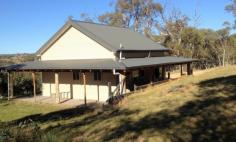  74 Yallaroi Road Jindabyne NSW 2627 $429,000 Country Cottage Property ID: 9664257 A well presented, new zinc alum clad cottage set on 8 acres of fully fenced, beautiful bush land at Abington Park, Moonbah. The residence consists of two bedrooms, combined bathroom/ laundry, open plan kitchen, dining and large living area which opens onto the verandah surrounding the cottage. There is a large loft area suited to main bedroom or dividing into separate rooms. The home has a 22,500 litre water tank on pressure pump with instantaneous gas hot water and heating. There is a large levelled area below the home suitable for another home or a sizeable shed. It is set privately yet has extensive and amazing rural views from the verandah. Land Area 	 3.31 hectares 