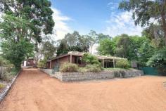  630 Rosedale Rd Chidlow WA 6556 $490,000 HUGE HOME ON HALF ACRE !! This large brick and tile 250 sq m home sits on a half-acre in Chidlow close to shops and cycling distance to Lake Leschenaultia.  The home was built in 1973 and underwent extensive extensions around 1980. Recently the home has undergone a further make over including painting throughout and new carpets. All areas in this home are generous. After entering the front door to the right is a large living area adjacent is a meals/dining area. To the left are 3 good sized bedrooms, linen closet and main bathroom. Behind the living area is a good sized kitchen with laundry and separate toilet adjacent. Behind this is the extension which comprises a huge carpeted living area with a wood stove and split system air conditioner, huge master bedroom and large bathroom with a separate toilet. The bedroom and wet areas are separated by an area suitable for a cloakroom. To the rear of the home is a large open faced shed and separate workshop which is paved and powered. These out buildings have a side access. The home is surrounded by easy care gardens. AQUA CULTURE POSSIBILITIES The property has a concrete pond suitable for all types of aqua culture. The middle of the pond is over 2 metres deep, which is a requirement for raising Marron. Due to the large volume and area of water, fish such as Silver Perch and Barramundi can be grown from fingerlings, and Koi Carp will grow to a large size, together with aquatic plants such as water lilies, watercress, water chestnuts and milfoil. 240v electricity is available for pump circulation and the 2 pond lights thatcan be left on at night to attract moths and other nocturnal insects which provide food for the fish, together with Dragonfly eggs and larvae during the day. Other features: Close to Shops,Garden,Formal Lounge,Separate Dining Property Details Elders Property ID: 9190895 4 bedrooms 2 bathrooms Land Area 1998 square metres Air Conditioning 