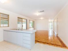  24 Feilman Dr Leda WA 6170 $329,000 WALK TO SCHOOL AND SHOPS This is an Excellent Opportunity to leave your car at home as this 4x2 family home is only a short walk to the Local Primary School and Shops. Entry takes you into the Separate Lounge room with wood look flooring, this room has a Foxtel Point and front Roller Shutters. The Master Bedroom also has a front roller shutter and is just off the Main Entry and this accommodates a queen size bedroom suite with ease. There is a walk in robe in the Master Bedroom. With ducted air con throughout the home- summer will never be a problem!! The Open Plan Kitchen/Meals and Family room is spacious and has beautiful wood flooring. A sliding door takes you out to the huge Patio Entertainment area. Situated on a 684sqm Block with extensive paving, grassed areas and loads of parking this home is ready for a family to walk right in and enjoy the lifestyle. FEATURES: Four Bedrooms Two Bathrooms Separate Lounge Room Open Plan Living Skirting Boards Kitchen with Gas cooker Electric Oven Range hood Pantry Ducted Air Con Gas Storage Hot Water Security Doors/Windows Roller shutters  Pet Door Patio Carport Garden Shed 684sqm Built 1993 Land Rates $1,579.00 Water Rates $763.56 Property Details Elders Property ID: 9985631 4 bedrooms 2 bathrooms 2 car parks Land Area 684 square metres Double carport 