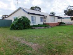  24 Moir Rd Ravensthorpe WA 6346 $210,000 You Beaut’ Family Home Situated on a massive 1370sqm corner block on the edge of town near a great 4WD track into the Fitzgerald National Park. This spacious home has loads of room for the whole family and all the toys you could need to accommodate. There are four bedrooms, 2 with built in robes and each with a ceiling fan. The family sized bathroom has a shower , separate tub and roomy vanity. There is a front lounge room / living room plus a huge living room / playroom / theatre room extension which enjoys a wood fire for the chilly winter nights plus huge reverse cycle air con.  The kitchen is a chef’s delight with loads of bench space and cupboard space, a double sink, gas oven & stove top, large tiled splashback, a dishwasher and good pantry. This adjoins a comfy dining area with pitched ceilings and slate flooring. Outside there’s an abundance of space – from the brick paved barbie and alfresco entertaining area, to the powered workshop/shed. There’s a large grassed area out the front and partial fencing. The property would be ideal for a tradie or contractor with lots of equipment and vehicles to park up, or a large family who need space to spread! Other features: Built-In Wardrobes,Fireplace(s) Property Details Elders Property ID: 9589849 4 bedrooms 1 bathrooms Land Area 1370 square metres Air Conditioning 