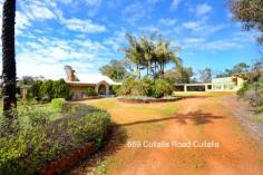  669 Cullalla Rd Cullalla WA 6503 $1,950,000 Grand Design & Potential at Gingin’s secret location! • 	 Executive luxury residence & infrastructure located only one hour north of Perth • 	 Lends itself to corporate facilities or a hospitality function centre • 	 825 acres with approx. 300+ acres arable • 	 Sensational virgin bush to enhance the ambience of elite privacy • 	 Abundant water….all year round solar powered bore and 72,000gal rainwater storage • 	 Rammed Earth home with 1200sqm under roof boasting spacious 4 bedrooms with ensuite and 2 additional bathrooms, open plan kitchen overlooking enclosed indoor pool/spa, massive formal lounge with surround sound system and Toodyay stone fireplace, the cellar of your dreams and an alfresco area that is second to none! Additional adjoining sheds/storage to accommodate the car enthused entrepreneur. • 	 Oasis of reticulated & established gardens  • 	 Large 120ft commercial shed • 	 Satellite • 	 Neighbour of Loose Leaf Lettuce company highlights potential of this property • 	 Totally unique, see it and make an informed decision for yourself! Other features: Built-In Wardrobes,Close to Schools,Close to Shops,Close to Transport,Fireplace(s) Property Details Elders Property ID: 9650309 4 bedrooms 3 bathrooms 5 car parks Land Area 825 acres 5 car carport Swimming Pool Air Conditioning 