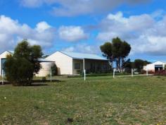  36 Blue Vista Hopetoun WA 6348 $399,000 Classic Homestead and Equestrian facilities Five star accommodation for you and your horses close to amenities of Hopetoun. Whether you are simply seeking a rural lifestyle or serious about horses, this property will have immense appeal. Its truly one of a kind and a pleasure to offer to the market for the first time. Certainly the best appointed equestrian facilities in the District – plus a lovely modern three bedroom two bathroom home. Property features include: • 	 6.98 Hectares (17.24 acres) with 8 year old fully insulated colorbond Homestead. • 	 Large 10 x 8 metre barn style triple lock up garage • 	 Quality stable complex (approx 12 x 8 m) • 	 First class fencing with four paddocks all fenced with 6 plain wire electric fencing and pipe posts • 	 Water from a large dam plus there are 2 x 5000g and 1 x 10,000g water tanks to service the house and sheds • 	 House is lovely open plan design with modern kitchen, two well appointed bathrooms ( including clawfoot bath!), laminate flooring to living areas and carpeted bedrooms, R/C air con, wide verandahs to two sides of the house. • 	 Productive soils and good pastures with delightful native vegetation surrounding the homestead • 	 Stunning views to the Fitzgerald River National Park and East Mt Barren  Realistic vendors have priced this property to sell Don’t miss the opportunity – well below replacement cost. Property Details Elders Property ID: 9611214 3 bedrooms 2 bathrooms Land Area 6.98 hectares 