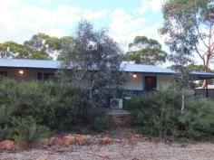  55 Dunn St Ravensthorpe WA 6346 $210,000 Modern Family Affordable Abode This well maintained and well presented home sits on a large quarter acre block just a short walk from town. It is a modern transportable with three bedrooms, each with a ceiling fan and built in wardrobes plus a study/office or small nursery. The lounge room has plush carpet and a reverse cycle air con to ensure you stay comfy year round. This opens onto the spacious kitchen and dining area. Kitchen is modern with good storage, gas hotplates and electric stove, dishwasher recess and good size pantry to keep the chef in the house happy. There is a main bathroom with bath / shower, two toilets plus a second shower in the laundry - great to rinse off after a hard days work, a gardening session or motorbike ride. Floor coverings, fixtures and fittings and soft furnishings are tasteful and contemporary with a warm and neutral colour scheme throughout. Outside - there's a fully fenced backyard with covered patio, small lawn area and a garden shed. The large front includes a single carport and patio. There are established, attractive natives providing privacy from the road. Gardens are reticulated making maintenance very easy. This lovely home has everything you could need. Contact us to arrange your viewing. Currently Tenanted Other features: Built-In Wardrobes,Close to Schools,Close to Shops,Garden Property Details Elders Property ID: 9685110 4 bedrooms 1 bathrooms Land Area 1012 square metres Air Conditioning 