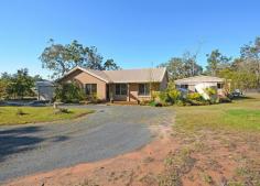  214 Honeyeater Dr Walligan QLD 4655 $419,000 COUNTRY LIVING - MODERN HOME This 2.13 ha property offers great country living yet only 10 minutes to Eli Waters Shopping Centre and 20 minutes to Maryborough. The back section of the property would be ideal for dirt bike riding while the front house area is fully fenced with graduated wire.  The three bay shed (10m x 8m) has 2 roller doors and a double glass door and one bay has been turned into an insulated workshop. Rainwater storage consists of 2 tanks with an 18,500 litre capacity and an enviro toilet system looks after the banana patch. School attendance is catered for with a school bus pick up which feeds into the schools in town. Designed for great outdoor living is the modern 3 bedroom home. The covered deck (4.8m x 25m) opens out from the kitchen and laundry and has power points and a TV point for those nights when entertaining.  This home was built to the owners' specifications with all frames and trusses treated for termites. There are plenty of storage cupboards, 3 good sized bedrooms with an ensuite to the main, and all with built ins, a TV point in the main bedroom, separate toilet and a good sized main bathroom with a tub, shower and exhaust fan. The all electric kitchen is modern and includes the dishwasher. Ceiling fans, vertical drapes and safety screens are throughout the home and the air conditioner is located in the open plan dining/living/kitchen area.  Just a great lifestyle block with a modern home.  Call for an appointment. Property Features Land Size : 21260 m2 