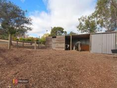  292 Bassnet Road One Tree Hill SA 5114 4.2 Acres Of Picturesque Rural Charm. This is the picture-perfect setting for your "Tree change"! An exciting opportunity for the astute buyer to acquire an exceptional and convenient Country Lifestyle property, yet still be central to all of life's handy amenities! Located next-door to forever popular ONE TREE HILL, this 4.2 (approximate) acre property offering a spacious three-bedroom home may be exactly what you have been searching for! The modern home has an open plan kitchen and meals zone. The kitchen includes electric cooking, ample bench/cupboard space and a dishwasher. The adjacent living room includes a combustion heater with slate surround and a reverse cycle air-conditioner. Two of the three bedrooms offer you built in robes and the updated central bathroom features a separate water closet and his' and hers' vanities. Further home features include ducted evaporative air-conditioning, an alarm system, spacious laundry leading outside, a single undercover carport and a delightful paved entertaining area with views an abundance of views!  Outside is where all the fun begins! There is new, ample high quality electric fencing to two sizable paddocks, an updated three bay stable block with tie up area, lockable feed shed and separate lockable tack room. A dam at the front of the property offers you an attractive outlook and has a pipe leading through to a water tank located at the home. The water on the property is by way of rainwater tanks, located within close proximity to the home. A chicken run is another new addition to the property and there is an option to easily make another fenced day yard. The paddocks are designed as horse friendly yet there are multiple opportunities with a property like this only limited by your imagination! Direct access to 1000 acres (approximate) of natural bush land for trails for horse riding or bushwalking within the Para Wirra Recreation park. Please Contact Agent For Further Details RLA 235 270   Property Snapshot  Property Type: House House Size: 127.00 m2 Land Area: 4.20 acres 