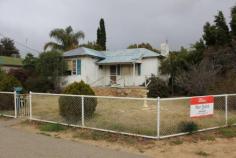  33 Cunningham St Merredin WA 6415 $69,000 LARGE 1080m2 CORNER BLOCK - RENOVATE OR DETONATE This 2 bedroom renovator is prime for development being a large 1080m2 corner block. The choice is yours to either renovate or detonate. For sale on behalf of the Executor of an Estate and to be sold in 'As Is' condition. All written offers presented to sellers for consideration.  All inquiries to exclusive selling agents - Elders Real Estate, phone Will Morris 0448 415 537. Property Details Elders Property ID: 9866916 2 bedrooms 1 bathrooms 1 car parks Land Area 1080 square metres Car Parks: 1 