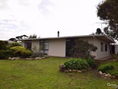 7 Seaview Rd Kingscote SA 5223 $385,000 1/2 AN ACRE ON TOP OF THE HILL! Looking for home on a bigger block with sea views? Tightly held location at the top of the hill, this attractive property boasts sea views north over Shoal Bay and behind over Nepean Bay. Sited on a corner block on a large 2000m2 with subdivision potential (stcc). The home has had all the big ticket areas completely renovated so kitchen, bathroom and laundry. The brand new, high quality "Swagman" kitchen includes a Miele dishwasher and plenty of bench space. Open plan living includes slow combustion fire which warms the whole home. Brand new bathroom with floor to ceiling tiles and seamless shower alcove for easy cleaning. Each bedroom has built in robes along with a linen press in hallway, so there is plenty of storage. Outdoor patio offers a protected place to entertain with enclosed yard safe for kids or pets. Watch the changing seascape from the kitchen window or patio.  Outside there is plenty of room to enjoy, with the boundaries fully fenced, plus the house is separately fenced, along with the front of the block for chooks and an extensive veggie patch. Large double shed with workshop to tinker in. This is what KI life is all about.... Grow your own food and enjoy the lifestyle of spacious, seaside living. Contact Kate Palmer on 0438 531 480 to make a time to inspect. PROPERTY DETAILS $385,000  ID: 375904 Land Area: 2000 m² Zoning: Residential 