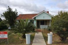  5 Council St Merredin WA 6415 $110,000 ENTRY LEVEL RENOVATOR Calling all you renovators or 'The Block' fans ready for your first renovating project. For genuine sale by executors of an estate with all offers presented for consideration. Huge block of 1075m2 with 23m frontage to street. Located just South of St Mary's Primary School and Catholic Church. Includes 3 bedrooms, 1 bathroom, lounge entry, eat in kitchen, large laundry and separate W/C. Solar HWS and blanked off original fire place. Two rear iron garden sheds and mixed fencing. All inquiries to exclusive selling agents - Elders Real Estate, phone Will Morris 0448 415 537. Property Details Elders Property ID: 9784659 3 bedrooms 1 bathrooms 2 car parks Land Area 1075 square metres Car Parks: 2 