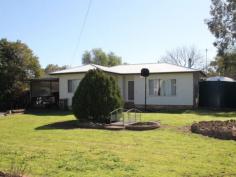  4 Allen St Quirindi NSW 2343 $200,000 Family Home or Investment 3 bedroom weatherboard home located in a quiet area on a 1012sq,m block. Ideal owner occupier or investment property with a rental of $270/wk and a return of 7%. Modern kitchen with walk-in-pantry L shaped lounge & dining room with wood heater & wall A/C. Bathroom with shower, bath, vanity & toilet. Polished timber floorboards throughout. Outdoor entertainment area. Cubby house for the kids plus dog run for the pet. Private backyard and large rainwater tank. Double carport attached to the home plus workshop & carport in back yard. For further information please contact Luke Scanlon 0419 495147, Ray White Quirindi on 02 67461270 or visit our website at www.raywhitequirindi.com. 