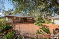  45559 S Coast Hwy Kalgan WA 6330 $455,000 Original, Quirky and Utterly Gorgeous • Backyard access to fresh water Chelgiup Creek • Access to Kalgan River for fishing & canoeing • 1.63 acres of stunning oasis & seclusion • A wonderful quirky home with cathedral ceilings • Wide wrap-around Jarrah verandahs with superb outlooks • Three bedrooms, semi ensuite bathroom, two WCs • Large reception area plus gorgeous mezzanine  • Separate studio & a double powered garage with workbench • In desirable Upper Kalgan only 8k from Bakers Junction • Rare, yet tame wildlife on your doorstep. When the ordinary just won’t do! You’ll easily fall head over heels for the character and charms preserved in this delightful property in Upper Kalgan. A lifestyle only imagined can now ring true as you fish all day long and launch a canoe or two into the river from this magical property. And for the artist in you, you’ll never be short of a muse. With so much to see, it’s a hideaway forever type of home where inspiration will never run dry.  As the sun gently sets over the delicately sloping garden down towards the creek; open a bottle of champagne, sit on the verandah and entice the rare, yet tame ringtail possums’ out of their tree and enjoy an array of birds that comfortably come to join your company. Back inside the home, stunning slate floors are a real feature as well as the open timber staircase that leads you up to the mezzanine floor, perfect for a library or secondary lounge perhaps. From here you overlook the reception/dining and lounge area where you can admire the incredible craftsmanship of the property. With plenty of level lawn, you can be self-sufficient, on 1.63 acres, veggie patches and chook pens could easily be a reality. Plus, you’ll never run low on water with a pump accessing the creek as well as a sufficient water tank. A log burner will keep you warm and with instant gas hot water you’ll never have an uncomfortable day again. An absolute delight to view with so many added perks, including a separate studio behind the home and double garage with workbench as well as well landscaped gardens with a welcoming, easy drive-in and out driveway.  Surrounded by mature trees for added seclusion, the home has convenient, direct access to the South Coast Highway. Original, quirky and utterly gorgeous. Other features: Built-In Wardrobes,Garden,Secure Parking,Polished Timber Floor,Separate Dining,Separate studio Property Details Elders Property ID: 10059239 3 bedrooms 1 bathrooms 2 car parks Land Area 1.63 acres Double garage 