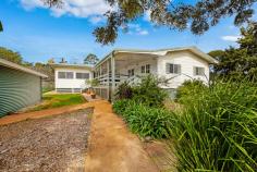  7 Lindan Ct Cabarlah QLD 4352 $470,000 COUNTRY STYLE FARM HOUSE REQUIRES NEW NATURE LOVER Set on a picturesque 5800m2 of established flat land this fully renovated property offers a lifestyle few can match. Picture yourself on a lazy Sunday morning soaking in the sun on the North-East facing deck, feeling you are a world away but reality you are only a short 22minute drive to the Toowoomba CBD.  Surrounded by establish gardens, chook pens, multiple sheds and even your very own bore, this property offers a piece of country lifestyle without all the hassle. Big enough to support a few large animals and the largest of vegetable gardens, but small enough that you don't have to spend your weekends maintaining it, it's the perfect blend. If getting back to nature is on your hit list, you can watch wallabies graze the land at sunset or watch the abundance of birdlife.  Recently renovated the property has paid homage to the area and is finished in a modern farm house feel. Near new kitchen, ensuite, family bathroom and internal finishes make this ready for your family today. Cleverly positioned in the heart of the home is an exceptionally generous kitchen, dining and family room all on the North East aspect. This flows perfectly to the deck through two double French doors. A second enormous family room is on offer, flexibility here is key - it could be a formal lounge and dining, games room for the kids or even a pool room if needed. It has a country feel all round this home but offers modern convenience - Reverse Cycle air-conditioning, wood heater, solar panels are just of few of the homes features and it truly deserves an inspection.  Further features of the property include:  - Large kitchen complete with 900m oven, 900m gas stove top, island bench and full size pantry  - Exceptional air-conditioned master suite, with generous ensuite  - Further 3 bedrooms all with built in storage  - Impressive family bathroom  - Multiple living areas, one complete with wood fireplace/heater and reverse cycle air-conditioning  - 7.5m x 7.2m Shed with two door access  - Double height farm style shed, 6.0m x 6.0m  - 1.5kW Solar System  - 30,000 Litres of tanks plus connected to town water  - 170ft Unmetered Bore water depth at 32ft with drinkable water  - Stables (3 stalls and tack room)  - Large Chicken Coup  This really epitomises the country life style and if you are seeking a lifestyle change but close to the city this is a rare find. Be quick to attend the open for inspection as interest in these properties is strong. 