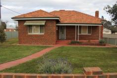  3 French Ave Merredin WA 6415 $208,000 BRICK AND TILE IN EXCELLENT LOCATION This rock solid brick and tile home is built on a large corner block with excellent location. Only a short stroll to the main street CBD and shops. Close proximity to Merredin District Hospital and both of towns schools. No direct neighbours other than across the street as behind and North side is the SDA Church and car-park. Consisting of 3 bedrooms, 1 bathroom, 2 toilets, formal lounge, eat in kitchen and laundry with workers shower. Original single garage shed and rear garden shed. Ducted evaporative A/C cooling throughout, wood fire to lounge and ceilings are insulated. Electric stove cooking and instant gas HWS. Contact exclusive selling agents Elders Real Estate to arrange your inspection. Phone Will Morris 0448 415 537. Other features: Close to Schools,Close to Shops,Close to Transport,Fireplace(s),Garden,Secure Parking Property Details Elders Property ID: 10353551 3 bedrooms 1 bathrooms 3 car parks Land Area 972 square metres Car Parks: 2 Single garage Air Conditioning 