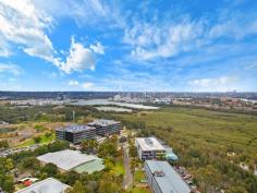  C2402/7 Australia Avenue Sydney Olympic Park NSW 2127 $1,050,000 - $1,100,000 Split-Level Luxe This one of a kind two-level apartment situates on the top floors of an ultra-modern and secure high-rise apartment block. The spacious living area on the lower level flows to the sky balcony and overlooks amazing 180 degree water views of the Parramatta River, Sydney Olympic Park and Sydney CBD. All of which can also be seen from the chef's quality kitchen which features caesar stone bench tops, Smeg stainless steel appliances and gas stovetop. The second level contains both bedrooms that are also gifted with the same spectacular views. A main bedroom incorporates a walk-in wardrobe and ensuite whilst the second houses a built-in. The two luxury bathrooms in the home are complimented by a third toilet and powder room in the lower level laundry. Ducted air conditioning, video intercom, secure car space, storage cage and outdoor gas outlet add to the convenience of the apartment's surroundings. With trains, buses, cafs, popular restaurants and all that the Sydney Olympic Park precinct has to offer literally at your doorstep, this exceptional residence is a must see. 