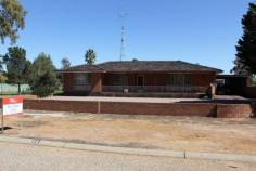  39 Doreen St Narembeen WA 6369 $229,000 SOLID HOME ON TRIPLE SIZED BLOCK Rare chance to purchase a solid brick home on a massive block of land in a great area of town. This home will suit either a retiring couple or a young family. Double brick and tile construction on a concrete slab. 3 bedrooms, 2 bathrooms, spacious lounge/living/dining and kitchen. Reverse cycle ducted A/C and solar HWS. Double length carport to North side of house and rear enclosed and tiled veranda. Large paved front yard section. Older rear double garage shed. Single land freehold title block of 2509m2 and corner location. All inquiries to exclusive selling agents Elders Real Estate, phone Will Morris 0448 415 537. Other features: Close to Schools,Close to Shops,Garden,Secure Parking Property Details Elders Property ID: 10403144 3 bedrooms 2 bathrooms 4 car parks Land Area 2509 square metres Double garage Double carport Air Conditioning 