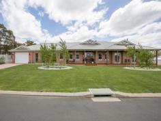  30 Leschenaultia Cir Donnybrook WA 6239 $899,000 LIGHT, SPACE AND EFFICIENCY Perfectly blending efficiency and attention to detail with modern decor and touches of old world charm, this beautifully, James Barker built, designed and laid out family home is all about light, space, and efficiency. Charming silver birches growing along the verges of this corner block, each in its own bed of white elyssum and dianthus, welcome visitors to the house. A Corinthian door of glass and wood opens on a light, airy foyer with a modern chandelier suspended from a ceiling rose.  As you follow the halls that lead off into separate family and guest wings, 32 course ceilings add to the free-flowing feel of the whole house. These high ceilings, along with the ornate ceiling roses featured throughout and the Marri wood flooring, give this thoroughly modern home a charming old world touch that contrasts beautifully with its modern aesthetic of sleek LED lights, white stone fittings and technology that works in seamlessly with the demands of modern life.  Throughout the halls that connect each area are nooks and recesses that house bookshelves and mementoes, making optimum use of space without creating clutter. One of the handiest is a drop zone just inside the door from the double garage, that has, as well as a bench top, a handy USB port and a food area for pets facing a cat door. Semi-frameless wood and glass doors connect each area of the house, allowing you to shut off an area without closing off the flow of light or visibility.  A gas fireplace surrounded by a polished wooden mantelpiece and granite slab gives a cosy feel to the formal lounge, a spacious and airy place for the family to relax. Lit by a large chandelier hanging from a ceiling rose, the room has double hung windows and two sets of French doors overlooking the street. The charming, well-lit main bedroom is a relaxing retreat that features his and hers walk-in robes, big windows and a door to the outside. The en suite has a double-sized shower, two basins, white stone benchtops and a separate toilet, as well as heated towel rails and under-floor heating. Bedrooms two, three and four have three-door built-in robes and automatic remote ceiling fans. Bedroom four doubles as an office. The heart of the house is the open plan living area, where the family room, dining room and kitchen co-exist in the sense of light and space that characterise the whole house. Hanging lights give a pleasing aesthetic touch to the smooth lines and efficiency of this area. The kitchen features a Miele dishwasher, microwave, Smeg oven, five-burner hotplate with a range hood, a twin bowl sink with a water filter, soft-close drawers, and a walk-in pantry. A recess with space for two fridges has a tap installed at the back. Continuing efficient use of space is found with numerous handy storage areas under the white stone island bench.  A genuine bakers oven - in which you can light a fire in the top level and roast whatever you like in the bottom level - gives the dining room a cosy touch.  This open plan area leads onto the guest wing of the house, with a door onto a social area that could easily become a visitors’ hub or a children’s play area. This room, which opens directly onto an outdoor alfresco area, contains a sink, cupboards, drawers and a recess for a mini-fridge, making it the perfect overflow for hungry and thirsty guests or kids on a busy day. The main bathroom has a big shower, heated towel rails and underfloor heating, as well as a deep white stone bathtub to soak all your cares away in. The laundry lays on yet more storage space, with a walk-in linen closet and a broom closet. Outside, a rolling lawn area leads past a charming grape arbour to five raised vegie beds, a patch of carefully tended bushland and a mini-orchard. The retained bushland is dominated by tall, beautiful Xanthorrhea overlooking flowering undergrowth and a few new touches, such as blueberry bushes and five Chinese tallow trees that, when established, will provide plenty of shade. Apple, lemon, lime and orange trees are establishing themselves down one side. The whole garden is reticulated from a bore and variable pump. The yard is fenced in all the way around, providing a fun and secure play area for the kids. Other features: TV points in the lounge, main bedroom, guest bedroom, sitting room, dining and family area. Double power points Four USB points (kitchen, office, drop zone and guest bedroom). Insulated Ducted reverse cycle air conditioning Three linen cupboards 5kw Solar panels Solar hart hot water system Secure gates Workshop/mud room at back of single garage together with outdoor double stainless steel sink/vege spray/ hot and cold water Property Details Elders Property ID: 10676031 4 bedrooms 2 bathrooms 3 car parks Land Area 2302 square metres 3 car garage 