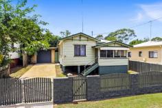  8 Wattle St Harlaxton QLD 4350 $349,000 Is this the biggest house on the market sub $350k in Toowoomba? Set on a glorious 761m2 with the rear yard primly positioned to catch a North East aspect this is an amazing amount of property for the price. Absolutely loaded this property offers - covered car accommodation for up to 8 vehicles, four bedrooms and study, multiple living rooms, large rear yard and even a view over the park. Competitively priced at $349,000 this is an amazing opportunity to secure a phenomenal amount of real estate for such an entry price. The property has recently undergone some updates including full internal repaint, new carpets and general refresh. Not everything is brand new but it is as neat as a pin and ready for a new owner today.  As you enter, you know this is a property you would be proud to call home; offering a great open feeling throughout. The sprawling floor plan offers a choice of layouts perfect for the family as it gives you the ability to be close to young children or create a separate zone for older teenagers. With a generous living at the front of the home encompassing vistas of the surrounding parkland as the main living, this expansive home also offers a second family room located at the rear; complete with a wood heater. The huge kitchen is very serviceable and is complete with approx 8 metres of bench space, a new oven, a new cook top, space for a dishwasher and massive amounts of storage. A separate dining is located directly from the kitchen; or you can chose to entertain your guest under the large North East facing rear patio.  There are four very large bedrooms all of which feature built-in storage. You have a choice of which room to use as the master, however the front room is away from the other bedrooms and a clever conversion would allow you to easily encompass the 2nd bathroom as an ensuite as they share a wall. This bathroom is complete with shower over bath and has ample room to add a second toilet. The second bathroom is perfectly located in the middle of the property to service the remaining three bedrooms. A large family sized laundry and study area complete the list of this exceptionally generous home.  The property features:  - Generous 761m2 allotment  - 8 Covered car spaces comprised of 4 bay shed, over height tandem drive through carport and second tandem carport  - 2 separate living areas, wood heater to rear living area  - Large North East facing covered alfresco area  - 4 generous bedrooms all with built in storage  - 2 bathrooms, one of which can easily be converted to ensuite  - Family sized laundry  - Open study which could be closed off to make a 5th bedroom if required  RealWay Property Partners Toowoomba is proud to present 8 Wattle Street, Harlaxton to the market. Join us at the next open home or arrange a private viewing by contact Cooper Watson on 0427 557 654. Property Features Water Rates : $265 Council Rates : $995 Land Size : 761 m2 