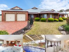  9 Barrow Ct Mount Barker SA 5251 $745,000 The art of living fabulously! Property ID: 10516195 Elevated at the end of an inviting cul-de-sac on a generous 2369sqm allotment this property exudes style and elegance and will have you thoroughly impressed! The huge home offers five well proportioned bedrooms, three generous living areas, high ceilings and high end finishes!  The 12 panel solar system is driven by a ‘solar river’ inverter and there is a separate solar system to heat the in ground salt chlorinated pool.  The home offers style and character with brick quoin work, 2.7 metre high ceilings, high gable roof and front verandah and steel framework. The intelligent floor plan with three distinct living zones provides flexibility for harmony and peaceful living. All of the flooring offers diamond style tiling, together with ornate diamond style inserts at the front door entrance and the bedrooms are carpeted. The formal dining and lounge are also connected via a servery to the huge kitchen / family area. This family living area also offers a Mitsubishi split system.  The kitchen is well appointed with central island bench, glass splash backs, double sink, Miele dishwasher. Omega range hood, gas stove top and separate wall mounted oven and microwave. Cupboard space is generous, including wall mounted glass fronted display cupboards and a walk in pantry. This north facing living area is light and bright with floor to ceiling windows and electric operated blinds.  There are five bedrooms (one of which is currently used as an office) the other bedrooms offer two door floor to ceiling robes. The master bedroom is of excellent proportion with two feature hexagon design windows. The ensuite is also very spacious with separate toilet, corner spa, three door, three drawer vanity and a sizable shower alcove.  The main bathroom offers a powder room with two door linen press, three door, three drawer vanity, the toilet is separate and there is a separate bath / shower area.  The laundry has its own outside access and the hallway leads to the two car garage under the main roof with automated roller doors and there is also a roller door at the rear for vehicle access to the backyard. At the rear of the home is a 5m x 5m hip roof undercover entertaining area, complete with high end cafe blinds, notably there is also extensive brick paving, landscape walling and storm water provisioning.  A high gable 15m x 10m three sided shed / together with a 6m x 2.5m extension, protects the inbuilt concrete fully tiled in-ground swimming pool, which is heated and salt chlorinated. Next to this complex is a separate 9m x 6m high gable lockable shed, with light and power and roller doors at both ends, this enabling a drive through to the rear grounds. The backyard beyond the pool offers a wonderful open space plus a Lemon, Apricot, Apple and Cheery tree, all of which are at a mature fruit bearing age.  The front garden and lawns offer a fully automated watering system. Rain water from a 5000 gallon 20,000 litre tank and pressure pump is used for virtually 9 months of the year, given the extensive roof catchment from all of the buildings. All in all, a well planned, highly developed property on an inviting street with lovely views in the impressive, desirable, Waterford Estate. There are plenty of Community parks and gardens and now with the added significant Bald Hills overpass / underpass which provides residents easy access onto the freeway (thus saving about 10 minutes), to either Adelaide or Murray Bridge. Building / Floor Area 	 527 sqm Land Area 	 2,369.0 sqm 