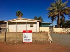  46 Watson St Mount Magnet WA 6638 $80,000 MOVE IN FOR CHRISTMAS Solid 3 bedroom fibro home with iron roof has come to the market in the town of Mt Magnet. There are 3 bedrooms, 3 with built ins and a big lounge room and combined kitchen and dining.  It's a flat 1012sqm block fully fenced with access to the backyard. The covered carport has caged in wired sides to secure your belongings. There are 4 air conditioners. The house is empty to utilise for your workers or just move in and enjoy the outback. Contact Francene O'Meara on 0457 345 900. Property Details Elders Property ID: 10695779 3 bedrooms 1 bathrooms 1 car parks Land Area 1012 square metres Single carport 