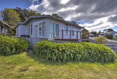  10 Douglas St Bicheno TAS 7215 $325,000 QUIRKY COTTAGES • COTTAGE & SLEEPOUT • APPROX 696m2 • NEARBY RICE PEBBLE BEACH & BLOWHOLE • FRESHLY REWIRED & PAINTED • MANCAVE & BAR General Features Property Type: House Bedrooms: 3 Bathrooms: 1 Land Size: 696 m2 