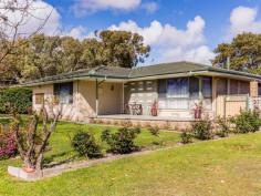  16 Parkhill Way Wilson WA 6107 600s $685,000 CENTENARY PARK FAMILY PRECINCT RING TO VIEW In a lovely quiet street leading to beautiful Centenary Park. a spectacular green, public open space where you can exercise the dogs, fly your kites and kick a ball, its huge! Walking distance to Curtin Campus and Waterford Shopping Centre, close to the bus and village shops. Facing north in one of Wilson`s most desirable positions. On 743 sqm, a fabulous late 60`s residence with all of the quality retro features of the popular era. Large windows, timber floors, generous size rooms and high ceilings. Recently refurbished with a new, quality ensuite, spa bath and walk through robes to the master bedroom. An excellent floor plan for a largish family , alternatively this design could also work well for student housing accommodation with a choice of 2 large living areas and a sizable kitchen and larder.  Front and rear gardens including lovely lawns and fruit trees are bore water reticulated, offering great outdoor entertaining and space to add a pool.  Wilson, on the radar at last! Where else can you buy a solid 4 bed 2 bath home on a full size block, around 13 minutes drive to the CBD ? easy access to airports, Welshpool, Canning Vale, Westfield Carousel, central to a host of aged care institutions . . . its extraordinary that this area has yet to enjoy the price surge of its close neighbours in the last 10 years.  Astute, savvy buyers will see the opportunity.  16 Parkhill represents the best value for money offered in Wilson, move quickly before its sold. 