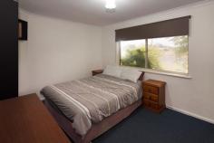  4 Hughes Cl West Busselton WA 6280 $369,000 BACKYARD AS FAR AS THE EYE CAN SEE On approx. 884m2 block sits this 3 bedroom, 1 bathroom home, 2 separate living areas, wood heater, a/c, big kitchen, gated side access, large paved gable patio, treed backyard, long work shed, designer chook house, bore. Features: Approx 884m2 block Side gated access Large paved / colourbond gabled patio Long work shed Wood shed Designer chook house Bottled gas Storage hot water Bore with new motor Large kitchen with loads of cupboard and benchspace Kitchen overlooking backyard and direct access to entertaining area A/C for summer Wood heater / log fire for Winter Gas oven Sep lounge Dining/living off kitchen Linen cupboard Executive Roll down blinds all throughout Separate wc room Within the bathroom you have sep bath in bathroom And separate shower recess with screen Mirrored vanity space Master with mirrored robe Second bedroom with walk in robe Security screened front door for summer breeze with security Undercover parking Character front verandah Outdoor electric points  Fully established garden and garden beds Good guttering Tile roof Two tone brick faade for country style 
