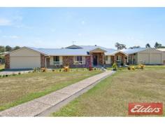  21 Panorama Dr Beaudesert QLD 4285 $469,000 Steel Frame Beauty on 1/2 Acre Located in the lovely “Kerry Hills” estate is this fabulous large home, it has a great floor plan with plenty of living areas: there is a formal lounge, formal dining, rumpus room and family room (which could easily be made into a media room).  The kitchen is very spacious and comes with dishwasher, great cupboards and plenty of bench space, the location of the kitchen makes it very accessible for all those family functions you would have.  The main bedroom is air conditioned and comes with ensuite and walk in robe and is separate from all the other 3 bedrooms – these 3 bedrooms are a good size and come with ceiling fans and built in robes.  Outside in the backyard there is plenty of room for the kids and the pets and the sunsets are just amazing from the entertainment area. Cost saving solar power has been put in and it’s a big 5Kva system.  The home comes with an internal double garage and there is a great shed, 15m x 7m, its extra high and comes with a carport that the sellers use for an extra entertainment area.  The block is fully fenced and the concrete driveway is in place, the home is on Council trickle feed water and there is a HSTP in place.  If your wanting peace of mind you cannot go past this lovely STEEL frame home, the position so close to Beaudesert and the lifestyle this home would give you - cannot be duplicated. Property Details Elders Property ID: 10688444 4 bedrooms 2 bathrooms 4 car parks Land Area 2644 square metres 4 car garage 