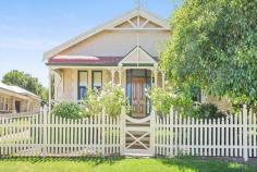  29 William St Victor Harbor SA 5211 $439,000-$459,000 Charming Central Bungalow House - Property ID: 914633 Character bungalow built approx. 1923, well sited on the higher side of the street on a 940m2 block with a very pretty frontage. Located "between the rivers" in the prime central CBD within easy walking distance to shopping centres, Medical Centres and the beach. Renovated and extended in the past, the home offers many original features enhanced including polished flooring, fretwork, 4 fireplace, generous sized rooms, lofty ceilings, bull nosed rear verandah. The floor plan provides 3 bedrooms, formal dining room/lounge, entrance hall, slated family/meals and kitchen with colonial windows overlooking the magical garden. Federation style bathroom with bath, shower, vanity and separate toilet. Laundry with lots of storage. Plenty of off street parking provide and a lock-up single shed.  Features  Land Size Approx. - 940 m2 