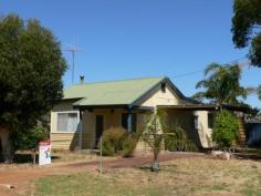  28 Coate St Katanning WA 6317 $109,000 Great Starter House - Property ID: 909235 Situated in a quiet Street and within walking distance to town. The home consists of a formal lounge at the front of the home. A central kitchen which has near new floor coverings.  With three bedrooms there is plenty of room for a family. The bathroom is opposite bedroom number three and the toilet comes off the laundry. To the right of the home is a single carport and a well-fenced yard is to the left of the home. This property won't last long at this price.  Features  Land Size Approx. - 587 m2  Close to Schools  Close to Shops  Close to Transport  Formal Lounge 