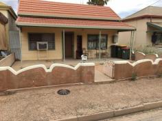  23 Revell St Port Pirie West SA 5540 $99,900  Lovely cottage at a great price This three bedroom home is a great first home or investment property.  Located close to town and the hospital the property has been a good rental for some time currently leased at $190pw till October 2017. Three bedrooms with a front lounge plus a kitchen with a large meals area. The bathroom and laundry is to the rear of the home with a separate shower and bath.  The yard is compact as the block is approx. 460sqm and has a rear pergola and shed.  Grab this one quick! PROPERTY DETAILS $99,900  ID: 394635 Zoning: Residential 