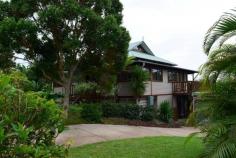  14 Barby Cres, Bangalow NSW 2479 From one of Bangalow's highest positions is this Award Winning designed "Bush Pavilion Home" with views of the village & glorious distant rolling hills through the lush, established, native & tropical foliage, creating an elevated but private oasis.  Flooded with natural light & the use of featured hardwoods throughout, with Blackbutt posts & rafters, Tallowood floors & New Guinea Rosewood bench tops in the kitchen & bathrooms - with all rooms capturing magical picturesque settings in each direction.  The open plan living flows to an undercover verandah, whilst the master bedroom flows to a private verandah leading to the garden - all making for easy level living & enviable entertaining.  Three generous bedrooms with the third being a perfect home office, teenage retreat or ideal creative space, which will inspire all as a loft style room, giving the 'treetop' feel enabling all to "get into the zone". Oh & a perfect position on the northerly side for an in-ground pool should you desire!  A huge workshop for all the toys, with room for a car & additional under-house storage, plus ample parking both off & on street, as this property is located at the end of the cul-de-sac.  15 mins walk to the village, local buses, shops & school.  Genuine owners bought elsewhere but will consider a delayed settlement - so do not delay inspecting this one. FEATURES Deck, Outdoor entertainment area, Terrace/paved, Balcony. 