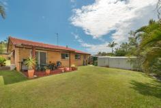  12 Allspice Dr, Ashmore QLD 4214 On Entry from your private secure front courtyard you will be pleasantly suprised to find :-  * L shaped lounge/family room. Sliders to outdoors * Galley kitchen overlooking rear garden. Good storage * Separate laundry. 2 bedrooms off central hallway  * Stylishly renovated main bathroom. Bath & shower * Master bedroom, large b/i robes & renovated ensuite * Study or 4th double bedroom at end of hallway  * Large 2nd lounge/rumpus room/separate slider entry * 2 more rooms with b/i robes opening to 2nd lounge * Air conditioning in both spacious family rooms  * Grassy minimal maintenance gardens. BBQ area * Undercover parking & side access/storage to rear 	 * Solar hot water. 5,000 ltr water tank. 2 large sheds * Close to schools, shops, transport & all amenities  From the numerous sold signs in the area, it would seem that astute house-hunters are rapidly discovering the tranquil, secluded "local traffic only" enclave of Bellevue Park, ideally positioned close to community facilities, schools, shopping, restaurants and public transport. Seriously deceptive with its unassuming streetscape, this super-comfortable family home is surprisingly spacious opening into a large air-conditioned open plan L shaped living and dining room which adjoins the smart black and white kitchen and laundry. A central hallway leads to two bedrooms, a stylishly renovated main bathroom with bath, separate shower and separate toilet and the master bedroom with ensuite - also beautifully renovated. The central hallway continues to a fourth bedroom or study then surprisingly opens out to another large lounge room with its own entrance and two more adjoining rooms. Depending on the requirements of its new owners, this ultra-versatile area could serve as two further bedrooms and a rumpus room, or every teen's dream - their own retreat, a work from home office, granny flat or a let-out.  Perfectly positioned, the kitchen overlooks the minimal maintenance rear garden and grassy area, great for supervising kids at play. This large garden could easily accommodate a pool alongside the under-cover barbeque area. There are two large sheds and side access - perfect for parking a myriad of boy's toys - as well as a 5,000 litre water tank. There's also solar hot water.  Offering space to spare, this is a home you would enjoy moulding to your own requirements while adding value in a highly desirable growth locale attracting escalating interest. And an added plus for the family is Sweetgum Park at the end of the street complete with kid's playground, a basketball practice court and community barbeque. Also a short walk to Sun Valley Park with Acres of parkland to explore along with off the leash dog zone and play ground. As an investment, for refurbishment or just as it is, this is a home you really should inspect. 