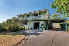  3 Broadbeach Dr, Carrickalinga SA 5204 Located in the heart of beautiful Carrickalinga, one of the premier beachside holiday destinations south of Adelaide, this rare offering will not last long. Situated on a large fully fenced allotment, with established gardens together with a double garage which could store a boat and car, this is your secure beach home ready to occupy. This two storey beach home has two separate living areas {upstairs and downstairs} both with two bedrooms and with separate bathrooms, so it can accommodate several families all under the one roof, perfect! Rear room could accommodate up to 10 teens (in swags). There is potential for creative thinking to transform the ground floor games area into additional living area. With only a short walk to the pristine beach, this is your ideal opportunity establish your own piece of paradise . Suggest you inspect as soon a convenient, you will be pleasantly surprised. 