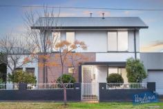  1/79 Mitchell Street Maidstone VIC 3012 Showcasing awe-inspiring architectural design, quality finishes and high end appointments, this handsomely proportioned three bedroom, two bathroom residence delivers discerning family home buyers and city professionals a sophisticated easy living environment. Boasting individual street frontage, the property is further enhanced by its close proximity to Highpoint’s retail, dining and entertainment hub, whilst zoning for Maribyrnong College is an added bonus. Step inside to a spacious open plan living zone incorporating a light filled meals space, central kitchen and a brilliant lounge area set beneath towering double height ceilings. Large glass aspects bring the outside in and ensure easy passage to a private courtyard where relaxing, entertaining and alfresco dining is certain to become a regular past time. Upstairs a mezzanine retreat is ideal as additional living/study space. While well equipped with stainless steel appliances, two-tone cabinetry, large pantry and stone counters, the kitchen’s main focal point is a huge island bench ensuring appeal for gourmet entertainers. Complementing two bedrooms are built-in-robes. A downstairs main boasts walk-in-robe and ensuite, and courtyard access. Additional highlights include luxury bathroom, powder room, ducted heating, split-system and automated garage with direct entry. With Flemington Racecourse, Melbourne Showgrounds, café strips, transport and the CBD all nearby. Features - Architecturally inspired three bedroom, two luxury bathroom residence - Stunning living domain with double-height ceilings and mezzanine retreat - Open plan kitchen showcases huge island bench, stainless steel appliances - Generous bedroom/BIRS, ground level main has WIR/ensuite, powder room - Private alfresco courtyard, ducted heating, split-system, automated double garage - Close to Highpoint shopping/entertainment precinct, schools and transport 