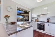  17 Taurus Cres, Modbury Heights SA 5092 $360,000 - $395,000 **Offers closing Wednesday 11/10 at 11am** WOW ... what a stunner! With immaculate presentation from front to back, there's nothing to do but move straight in and start enjoying this fantastic North facing home with its near new kitchen and covered timber deck for all weather outdoor entertaining. Light filled throughout with all the mod cons and a big back yard to enjoy, this one is the perfect first home or low maintenance rental property. Although you'll love being at home, the location is wonderful too, with a family friendly reserve and playground only a 3 minute walk away. Inviting indoors ... - North facing living room with big picture windows - modern contemporary near new kitchen with gas cook top and dishwasher with adjacent meals zone - 3 bedrooms, 2 with built in robes and 2 with ceiling fans - updated full bathroom and separate toilet - big picture windows capturing the light - ducted cooling AND ducted gas heating throughout - stained timber floors resembling the look of Jarrah - renovated laundry with built in bench tops and storage cupboards Enticing Outdoor spaces ... - covered timber deck with lighting - big sunny back and front yards with lush lawns perfect for the kids or Fido to go crazy! - garden shed - auto carport with additional off street parking for several more - gas hot water - large rain water tank with pump for high pressure garden watering Beautifully presented enjoying a light and bright modern contemporary ambiance throughout with big picture windows capturing the Northern sun. Move straight in and enjoy this much loved and superbly presented home with easy and quick access to Westfield Tea Tree Plaza, Clovercrest and Golden Grove Village. Smaller centres are dotted around this popular spot and they'll take care of those last minute necessities. Park the car at either the Golden Grove Village or Tea Tree Plaza bus terminus and catch the O'Bahn into the CBD. Zoned for The Heights School where I also attended. Helpful info ... all approximate 