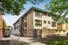  17/315 Flemington Road North Melbourne VIC 3051 Ideally situated opposite the expansive greenery of Royal Park with Flemington Road's iconic plantation streetscape, city bound tram service and dedicated bicycle lane at your door, this single bedroom apartment certainly boasts impressive inner city lifestyle advantages. A remote-controlled driveway gate and intercom assure peace of mind upon entering and safely secure the car. Once inside, the apartment is filled with natural light thanks to a sunny north westerly aspect. The central lounge separates the bedroom from the dining zone and extends to an intimate covered balcony. The tidy kitchen features stainless steel appliances and space for daily meals. The double bedroom is generously scaled and incorporates floor to ceiling, mirrored built-in wardrobes. Close by are handy communal laundry facilities also. Take full advantage of the secure off-street parking included to explore the city by tram which will have you at Melbourne's university and hospital precincts, the CBD, Flemington Bridge Train Station and Queen Victoria Market promptly, alternatively find yourself on CityLink or at Melbourne Zoo in just a few minutes. A winning combination of a spotless and spacious interior, inner city convenience and lifestyle benefits plus low ongoing maintenance will have new buyers and investors queuing to inspect! 