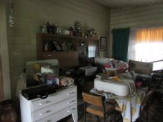  140 Lang St, Glen Innes NSW 2370 $80,000 * Old timber cottage with brick cladding * 3 double bedrooms * Wood heating in lounge room * Electric stove in kitchen * Dining room off kitchen * Shower over bath, vanity & toilet & instant gas hot water * North facing sunroom 