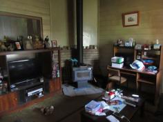  140 Lang St, Glen Innes NSW 2370 $80,000 * Old timber cottage with brick cladding * 3 double bedrooms * Wood heating in lounge room * Electric stove in kitchen * Dining room off kitchen * Shower over bath, vanity & toilet & instant gas hot water * North facing sunroom 