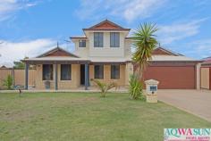  7 Navigator Drive Singleton WA 6175 $585,000 Step through the door of 7 Navigator Drive, Singleton to be greeted by seamlessly stained Timber floors, stair case to the master retreat and open plan living at its greatest. DOWNSTAIRS At the beginning of the home you have a reading corner/ study nook at the bottom of the stair case. This area can be sectioned of via the glass French doors which add some privacy whether you’re tucked away upstairs or wanting to relax with a book. At the front of the home is first bedroom which was formally the master bedroom before the addition upstairs. This room features it’s own WIR and en-suite. As you walk down the entrance hallway to the left you will find the 2nd,3rd and 4th bedrooms all sized nicely and with great storage, shared bathroom and laundry. The laundry has the WC and ample amounts of storage space with access to the east side of the property. Enter into the open plan living and gasp at the size of the Essa Stone island bench! Stand in the kitchen which is the hub of the home overlooking large dining, family and very tidy backyard. If you’re after entertaining or somewhere to call home then 7 Navigator Drive, Singleton is the home for you. UPSTAIRS Walk up the staircase to huge master retreat, the owners have done this extension right! A very large en-suite with separate spa bath, huge WIR, Reverse Cycle AC, 2 ceiling fans and a balcony which overlooks the backyard. The space they’ve created will definitely impress. BACKYARD This has it all! Poured limestone Huge alfresco patio Artificial turf Drive through access from the double garage Garden beds Huge heated pool Powered workshop with extra access from the east side and ample parking for the toys! APPROX DISTANCES – Browning Street Reserve (play grounds) – 83m – Beach Access – 700m – Singleton Primary School – 290m – Bayshore Shopping Centre – 580m – Laurie Stanford Reserve – 430m Now that you’ve found your new home, give TEAM Rolt a call at AQWASUN Estate Agents on 08 9537 1220 today! 