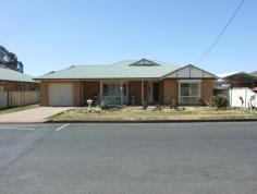  29 Palace St, Denman NSW 2328 $460,000 Modern brick veneer home that features 2 living areas, 2 bathrooms. Comprises of entrance lobby, Living room set with split system air & ceiling fans, dining area, well-appointed kitchen with good cupboard & bench space, walk in pantry under bench oven & dishwasher. Off kitchen is the family room, tiled throughout and set with split system air/cond & ceiling fans. Main bedrooms has large built in robe, ceiling fan and ensuite, all other bedrooms also with built in robes & ceiling fans, bathroom & laundry. Other features include attached garage, huge tiled/screened QLD room, in ground pool, garden sheds, 5kw solar system, solar hot water system all set on a level 1816mt lot with side yard access through to back yard. 