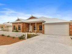  14 Tauman Loop, Guildford WA 6055 $665,000 Circa 2011. This light n’ bright 4 x 2 brick & iron home, boasting an innovative and creative floor plan affords plenty of room for the whole family and is nestled amongst quality homes. • 	 Picket fence, concrete driveway & veranda  • 	 Impressive hallway with French doors  • 	 Home Theatre  • 	 Private master bedroom with his n her walk in robe, superb ensuite with double vanity and separate wc  • 	 Fabulous kitchen with ample granite benchtops, cupboards galore!, stainless steel stove, range hood & dishwasher – lovely garden views.  • 	 Generous family room & dining room with alfresco views  • 	 Three additional roomy bedrooms (2 with walk in robes, 1 with built in robe)  • 	 Family bathroom complete with shower, bath & vanity  • 	 Separate wc  • 	 Well appointed laundry  • 	 Excellent storage  • 	 Large alfresco entertaining area under the main roof  • 	 Additional features: double garage with sectional door & shopping entrance for easy convenience, ducted evap air conditioning, easy care auto reticulated gardens, attractive timber laminated flooring to the living areas, quality carpet to the rest of the home.  block size 588m2. WALK IN & ENJOY! FEATURES Evaporative Cooling Fully Fenced Outdoor Entertainment Area Remote Garage Secure Parking Built-in Wardrobes Dishwasher 