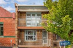  59 Baillie St, North Melbourne VIC 3051 Proudly taking its place within a distinguished row of double storey terraces, this pristinely presented two bedroom home will certainly generate excitement amongst astute investors looking to enhance their portfolio and those seeking city fringe convenience with lifestyle advantages. Beyond the handsome façade, the interior is fresh and inviting, introduced by a light filled lounge with traditional open fireplace. The kitchen incorporates a full complement of appliances while the dining domain opens to a low maintenance courtyard which doubles for secure off street parking via a ROW. Separated by a tidy sky lit bathroom featuring a bath and separate shower, two double bedrooms include mirrored built-in wardrobes. The master boasts a covered balcony accessed via double glazed glass doors. The second bedroom enjoys views capturing glimpses of the city and its distinguished church spires. Providing warmth during cold Melbourne winters is ducted heating. Fresh paint and new flooring throughout ensure the welcoming interior is simply radiant. Just a short walk to Errol Street’s trendy shops, cafes and restaurants, you’ll be spoiled for choice when eating out. It’s also situated just moments to Melbourne’s university and hospital precincts, the CBD, Queen Victoria Market, Flagstaff Gardens and any number of public transport options.  Features - Smart double storey terrace sure to attract new and young buyers plus investors - Free flowing lounge, kitchen, dining and courtyard living areas - Serviced by a fully appointed kitchen and tidy central bathroom - Two double bedrooms with mirrored BIRs, master with private balcony - Easy care entertaining courtyard alternatively provides secure off street parking via a ROW - Ideally placed for lifestyle enjoyment on the city fringe, walking distance to Errol Street cafes 