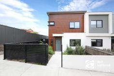  1/15 Mullenger Road Braybrook VIC 3019  $600,000 - $640,000 Great opportunity to purchase this modern, near new townhouse as part of one of the most prestigious developments in Braybrook. This beautifully designed home sets new standards in low maintenance luxury living. Top floor offers 3 decent size bedrooms with built in wardrobes, master bedroom with walk in wardrobe and ensuite, and additional central bathroom. Ground floor provides spacious open plan living and modern kitchen with quality finishes including stainless steel gas appliances and Caesar stone bench tops, adjoining meals and private courtyard, perfect for entertaining. Another great addition is a basement/lower ground level with a study space, European style laundry, powder room & under cover security parking with single lock up garage plus car space. Additional highlights include timber floorboards, double glazed windows, 4 separate split-systems heating & cooling to all bedrooms plus living area. Located in an ideal area with Pennell Reserve across the road, walking distance to Braybrook College, new Braybrook Shopping Centre and just a minute stroll to the Quang Minh Buddhist temple. Easy access to public transport makes this property a full package. 