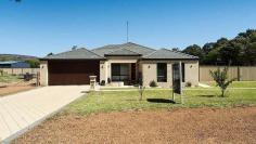  55 McLarty Street Waroona WA 6215  $490,000 Located on the edge of town on a huge 2233m2 block is this great family home. There is a huge yard, plenty of room for the kids to play that cricket match or kick the footy or for the man of the house to build a huge shed. There are a few fruit trees planted and also plenty of room for a chook pen. At the front of the home you have a double garage. When you get all in the front door on your right you have the big master bedroom, ensuite and BIR. On the left of the entrance you have a good size theatre room. As you walk down the hallway you have a study next to the master bedroom. The hall way brings you to a open plan living area. The modern stylish kitchen looks over the open plan living and out to the huge back yard and to the big entertainers delight of a patio. There is shoppers access from the garage to the kitchen. At the rear of the home you have the laundry that leads out to another private fully enclosed yard and the other 3 good sized bedrooms. The house has ducted heating and cooling and a tile fire. Call me today and inspect your new home. 