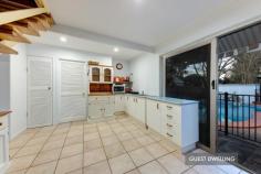  5 MELIA COURT  Mapleton QLD 4560 $537,500 With an air of the quieter pace of 'yester-year' this home is just that, a home not just a house. The style is suggestive of quiet charm, warm welcomes, cups of tea and home cooked meals. What it delivers is a well maintained home designed to suit a particular buyer.  The main residence is spread over two levels; the ground floor accommodates the country style kitchen, dining and lounge with bay windows and combustion heater, a bedroom, bathroom, laundry and the undercover patio. The second floor houses the master bedroom with ensuite, sitting room and balcony. Raked ceilings and plenty of light make this living zone a lovely place to sit and read.  The property also has a fully self-contained granny flat with kitchen, bathroom, bedroom, sitting room, laundry and private entry. Ideal as a separate guest house or for a little extra income.  Relax and entertain around the salt water pool during the summer months and stay warm and cosy in the warmer months in front of the fire.  SPECIAL FEATURES:  • Built 1990's • Air-conditioning • 5kW Solar Power • 4 Bedrooms | 3 Bathrooms - Over two (2) separate dwellings. • Outdoor patio/entertainment • Fully fenced • Central location, close to SCHOOLS/HOSPITAL/TRANSPORT  • Salt water swimming pool • Fire Place x 2  