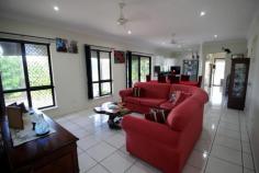  10 Francis Martin Street El Arish QLD 4855 $369,000 * Near new family home * 3 bay shed with separate caravan shelter * Energy Efficient Built in 2012, this fully fenced 3 bedroom, 2 bathroom family home on 903m2 is in excellent condition and located on a quiet and private street across the road from rainforest. The house has a great layout for a family with the main bathroom having a separate shower and bath. Step through the entry door into the formal living area, beyond this is an open plan kitchen, dining and living area with an adjoining shade cloth covered outdoor entertaining area. There’s an additional large covered outdoor entertaining area at the rear which runs the width of the house. To help with the cost of living, there’s a 2 solar panel hot water system. At the rear of the property you can find storage options for all your toys, including the boat, camper trailer and caravan. There’s a large 9m x 6m 3 bay shed with 2 garage door openings and 18 solar panels on the roof with a 3kw inverter. A large rain water tank. There’s plenty of space to store all your garden needs in a separate 3m x 3m garden shed. And to top it off, there’s a large covered 7.4m x 4.1m caravan shelter with a height of 3.6m at the apex and 3.1m high on the sides. This property is conveniently located within walking distance of local amenities including the Post Office, School, Tavern and the El Arish Golf Course. It’s only a short 15 minute drive to tropical Mission Beach where you can hop in your boat and head on over to Dunk Island or one of the other nearby local islands. 