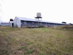  2544 Wisemans Ferry Road Mangrove Mountain NSW 2250 $2,950,000 Currently disused for chicken growing and waiting for an entrepreneurial grower to take advantage of the 7 chicken sheds, this farm is located on level land of 5.1 hectares (12 acres). The owner says there is plenty of spring water from 3 bores one licensed for 18 meg with on-site rainwater storage as well. The large family home the vendor estimates is 300 m2 downstairs and 150 m2 upstairs, could be set up to accommodate 2 families, but currently has 7 bedrooms, master with ensuite and walk in robe, formal lounge and dining area, TV room, Eat in kitchen and family area. The double garage has been converted to a work room and there is also an office. The rear verandah which has a 90,000-litre water tank underneath as described by the vendor, overlooks the in-ground swimming pool and onwards towards the farm. The sheds where used for growing chickens for many decades and have in part been upgraded by the previous owners. The current owners bought the property in 2003 and farmed for a few years after that, but the farm has been left disused for many years. In total, there were 8 sheds and the vendor said that would provide a total capacity of about 137,000 birds. The last batches the vendor said they grew on average 5.5 batches a year, roughly 17,000 birds per shed (total at that time 7 operational sheds) - around 654,500 birds per annum @ 5.5 batches. The property is tired, the house and chicken sheds need work, but for a good business minded astute farmer, progressive upgrading of this farm may with appropriate grower contracts and approvals, turn this tired old farm into a great money earning venture. The land is zoned RU1 - Permitted without consent; Extensive agriculture; Home occupations; Horticulture; Viticulture. Permitted with consent; Animal boarding or training establishments; Aquaculture; Bed and breakfast accommodation; Dwelling houses; Environmental protection works; Extractive industries; Farm buildings; Farm stay accommodation; Forestry; Garden centres; Home-based child care; Intensive livestock agriculture; Intensive plant agriculture; Landscaping material supplies; Open cut mining; Plant nurseries; Recreation areas; Roads; Roadside stalls; Rural industries; Rural workers' dwellings; Secondary dwellings; Veterinary hospitals; Water  Storage Facilities. 